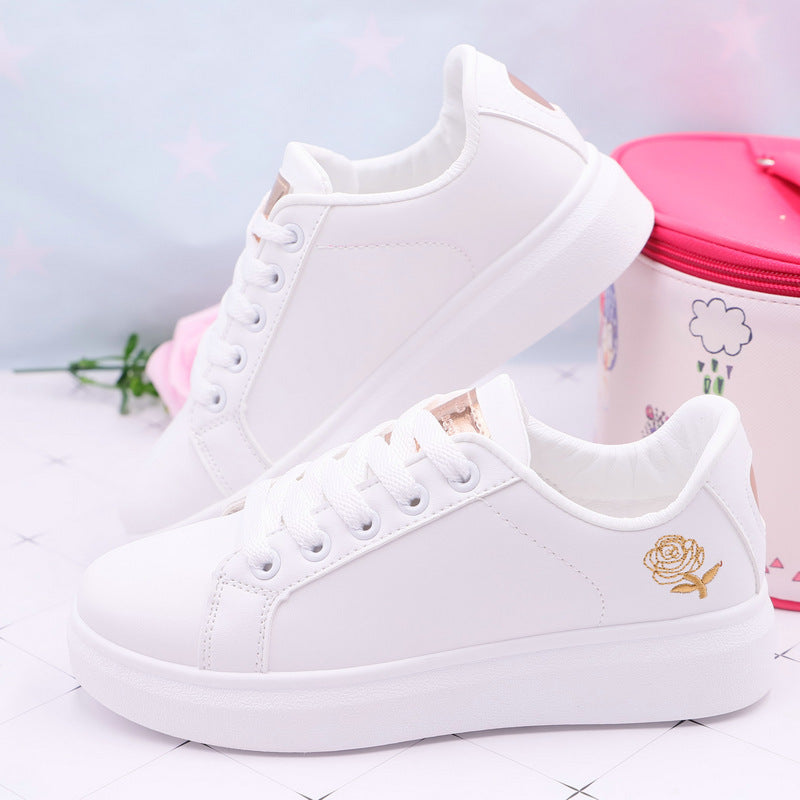 Baskets blanches roses