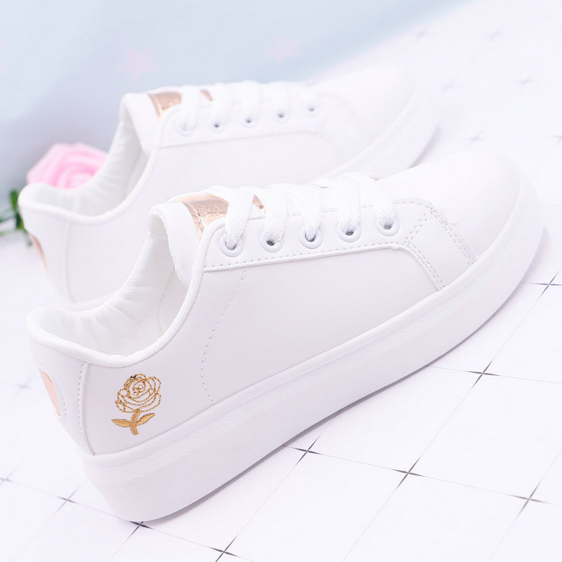 Baskets blanches roses