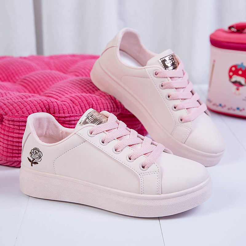 Baskets blanches roses
